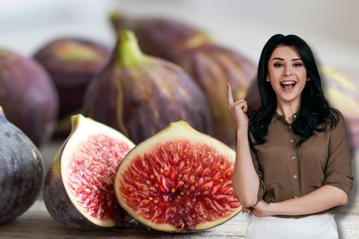 Fichi, donna felice con dito alzato