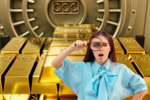 lingotti di oro e donna con lente di ingrandimento
