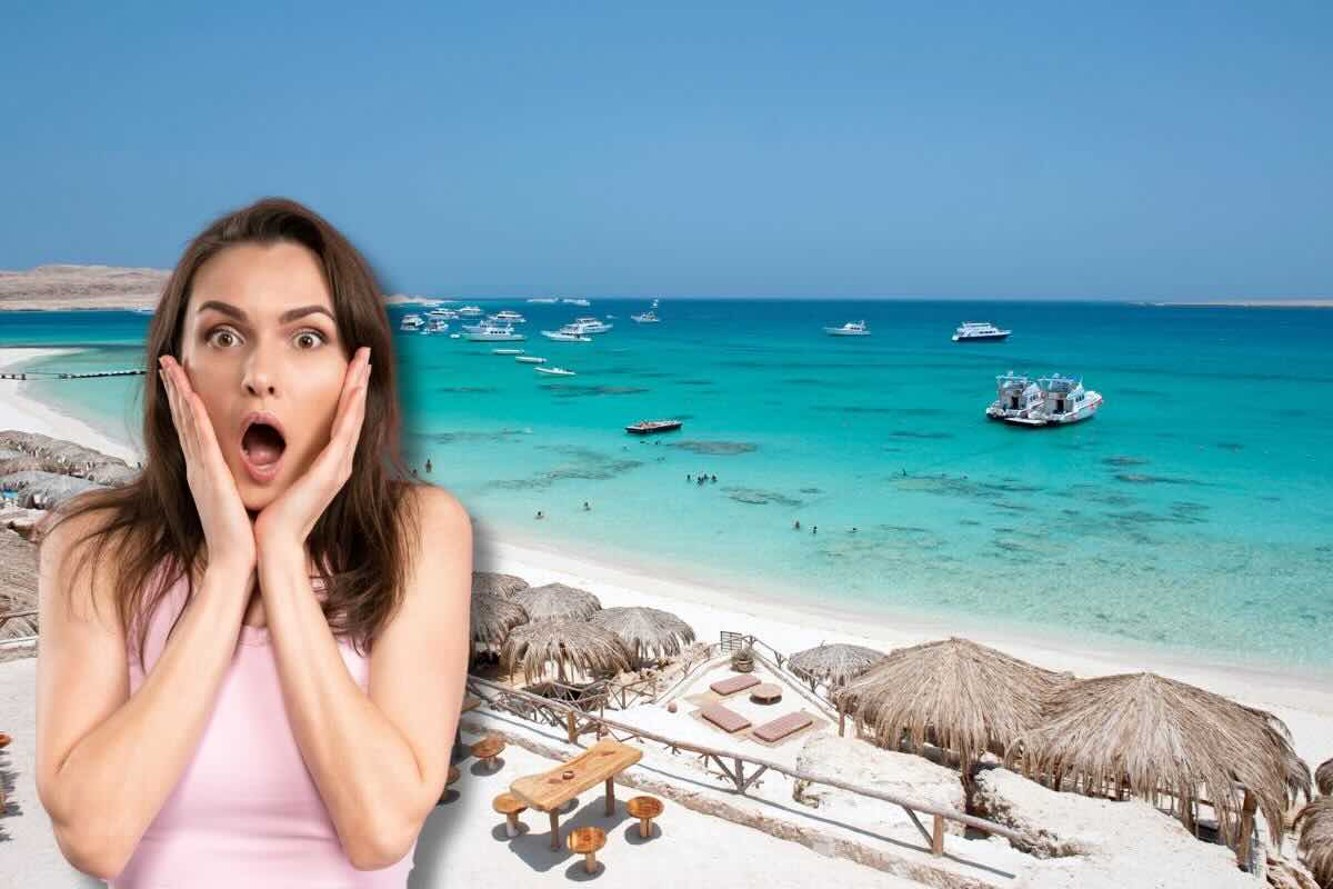 Donna sconvolta, spiaggia con lido attrezzato